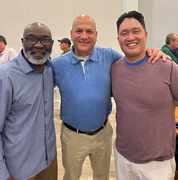 Retired Major League Baseball outfielder Mookie Wilson, left, and Long Island attorney Joel Sunshine, center, are two of the executives joining Jeff Ahn’s effort to establish professional softball in New York.