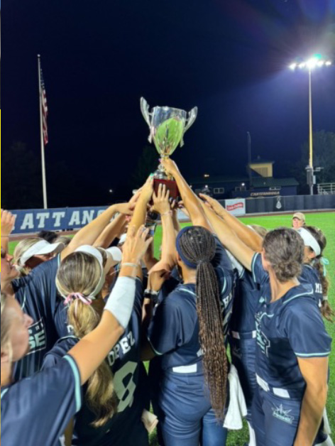 This moment captured the New York Rise softball team as every player tried to get their hand on their first trophy after winning the Inaugural Scenic City Pro Cup Championship